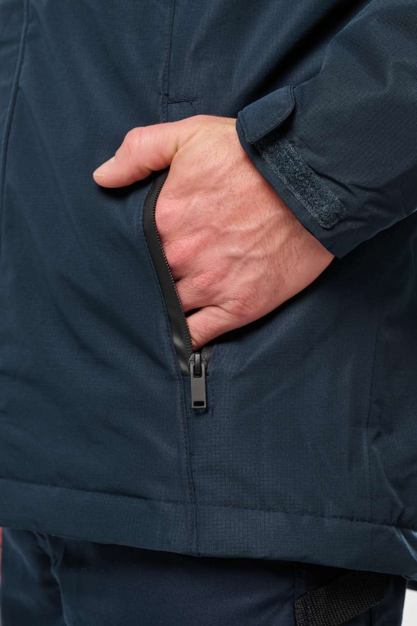 PARKA PERFORMANCE UNISEXE À CAPUCHE
