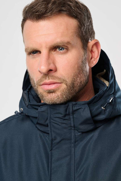 PARKA PERFORMANCE UNISEXE À CAPUCHE