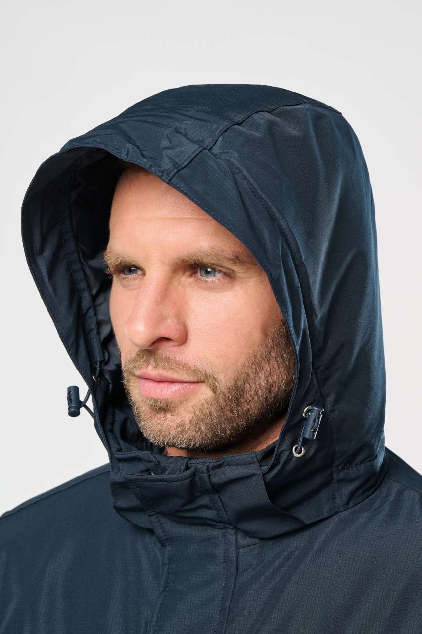 PARKA PERFORMANCE UNISEXE À CAPUCHE