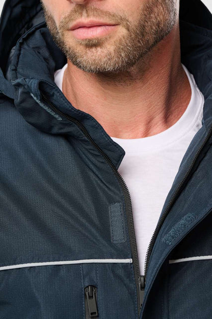 PARKA PERFORMANCE UNISEXE À CAPUCHE